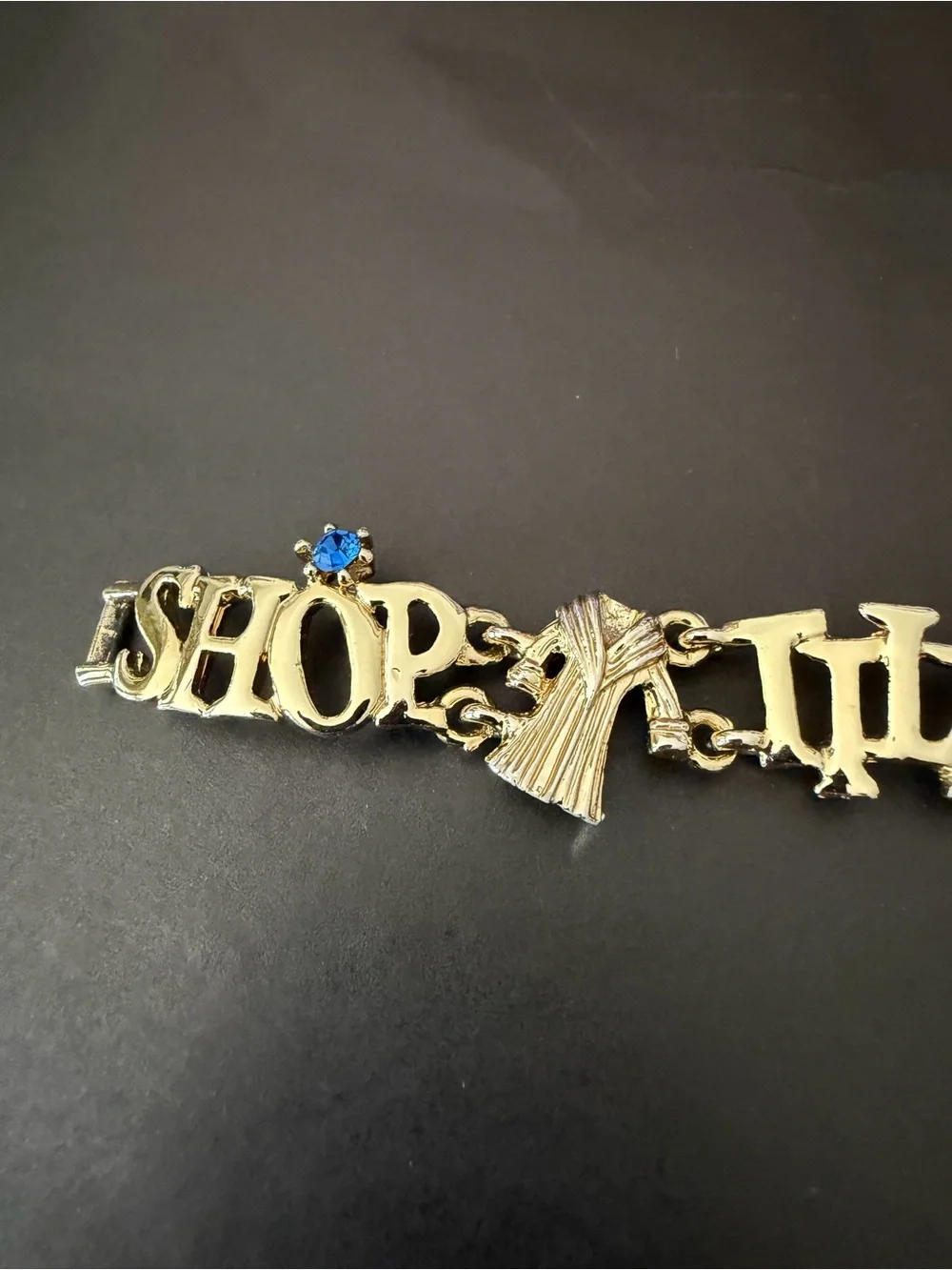 Gold Tone 'Shop Til You Drop' Charm Bracelet